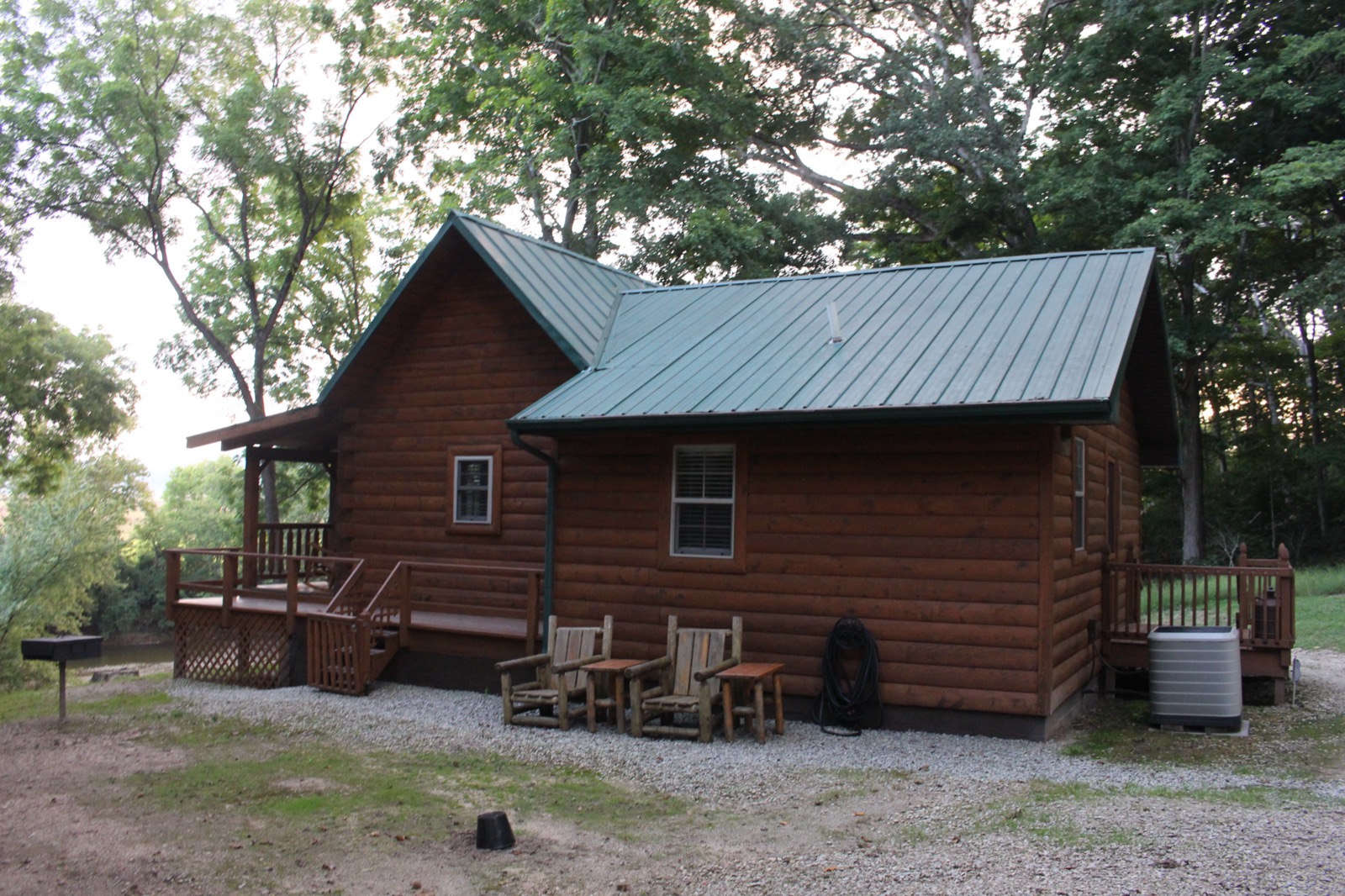 Cabin side yard with Adirondack chairs